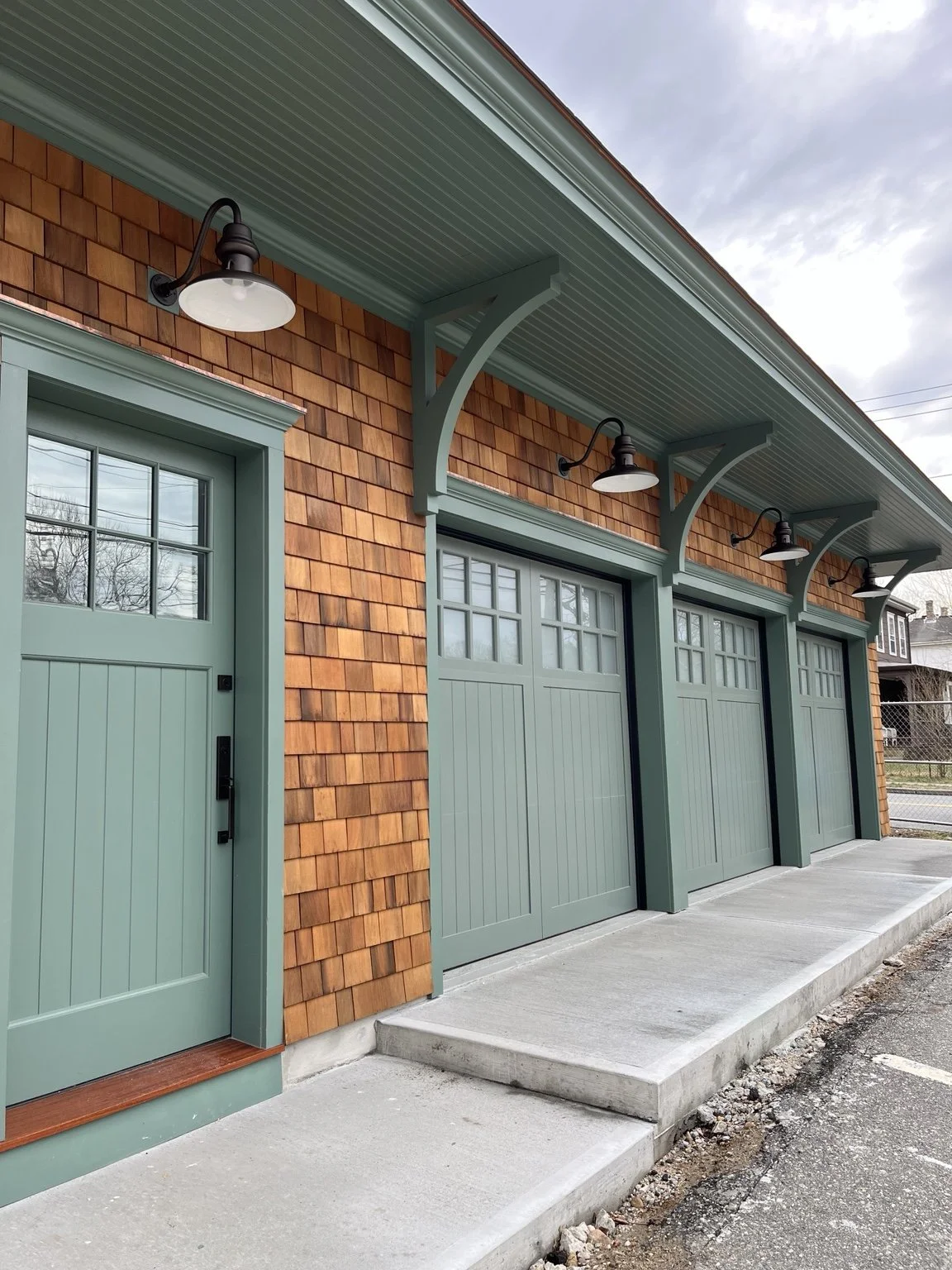 Custom exterior lighting installed by Source Electric on a Rhode Island garage