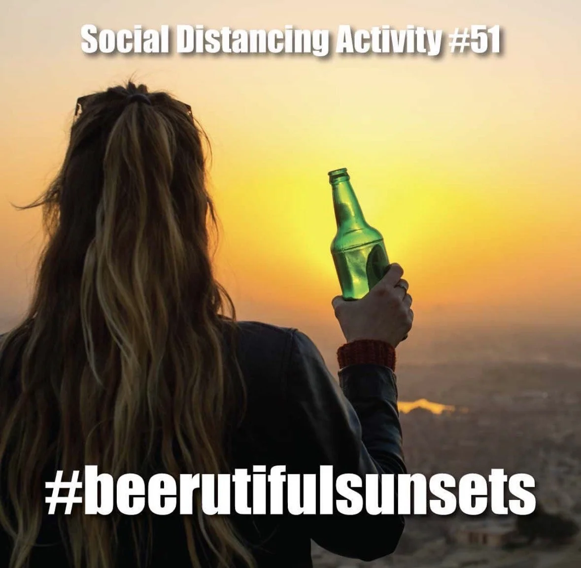 Woman with long hair holding a green bottle up during a sunset over a city, with text "Social Distancing Activity #51" and "#beerutifulsunsets"