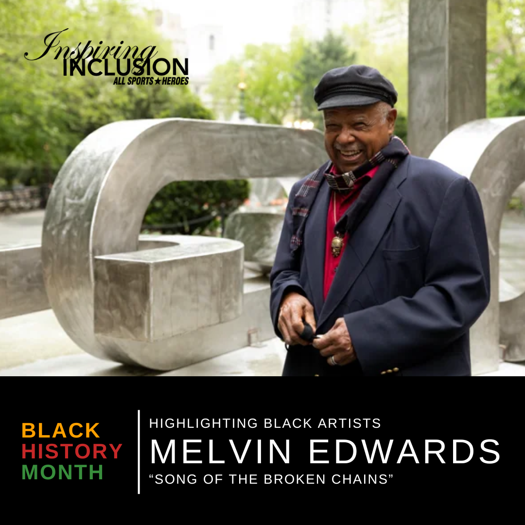 A smiling Black man wearing a black cap, red shirt, and blazer, standing outdoors among large metal sculptures, with trees in the background, promoting Black History Month and highlighting Black artist Melvin Edwards.