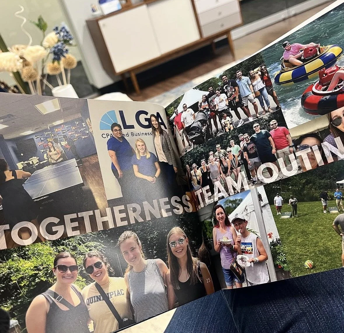 Open photo album page with group photos of people participating in outdoor activities, including boating and walking, and a logo for LGA CPA and Business.