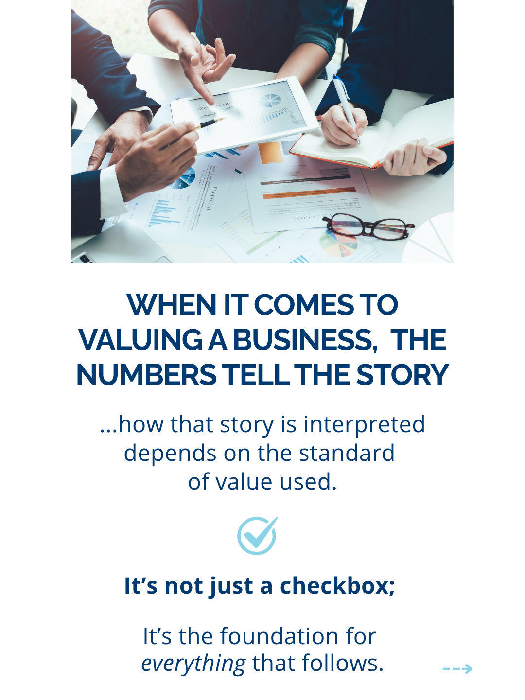 Business meeting with people reviewing financial documents and charts, using a tablet and writing notes on a notepad, with a pair of glasses on the table.