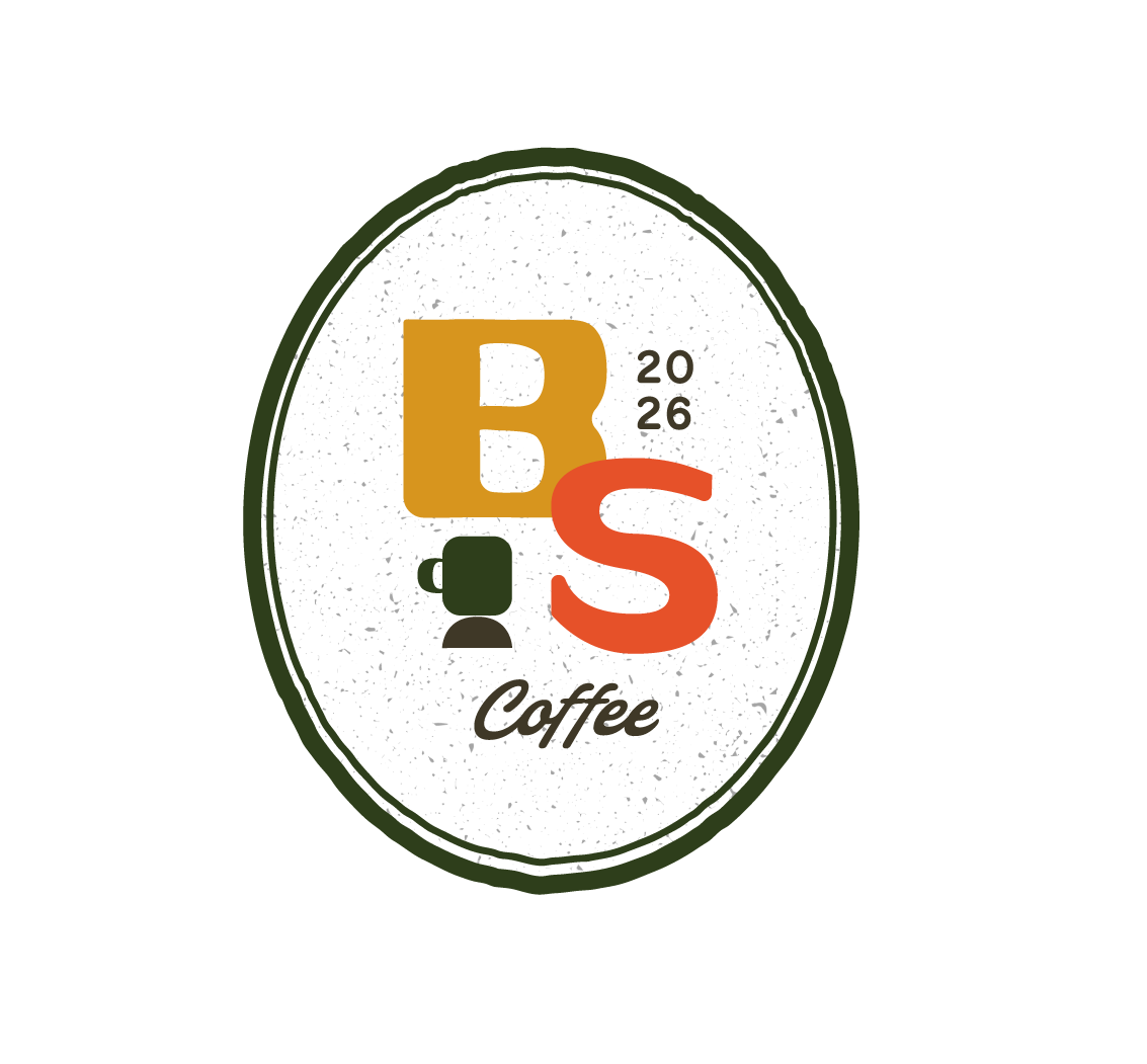 Egg shaped logo that says "B" S" "Coffee in yellow and orange colors with a coffee icon shape and green border.
