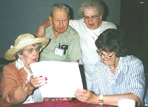 Dorothy Huntley, Virgil Huntley, Evelyn Simon, and Sally Lomas enjoy sharing historical information