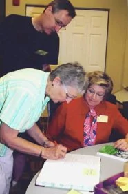 “Please sign the book!”