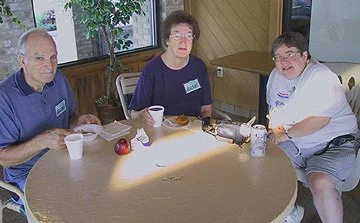 Here she enjoys fellowship with Member-at-Large Faith Greer and her husband, Jay.