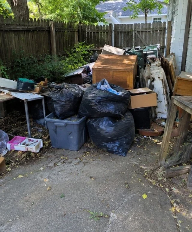 Outdoor junk removal project before cleanup