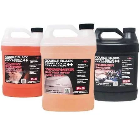 Three bottles of Double Black Remy Doyle Collection automotive product, likely some kind of cleaner or fluid, in orange, light pink, and black containers with black caps and labels.
