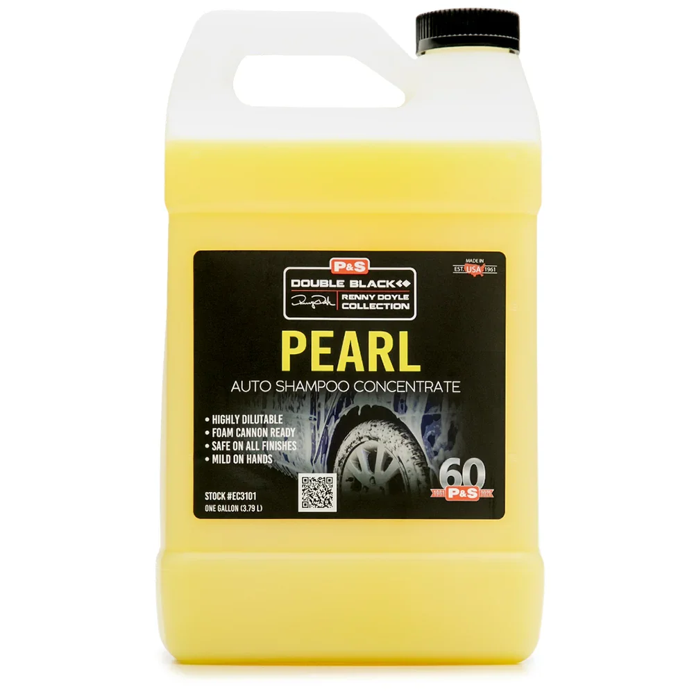Yellow container of PEARL auto shampoo concentrate with black label, featuring a car tire and text indicating it is highly dilutable, foam cannon ready, safe on all finishes, and mild on hands, with a black cap on top.