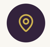 Map pin icon inside a dark circle