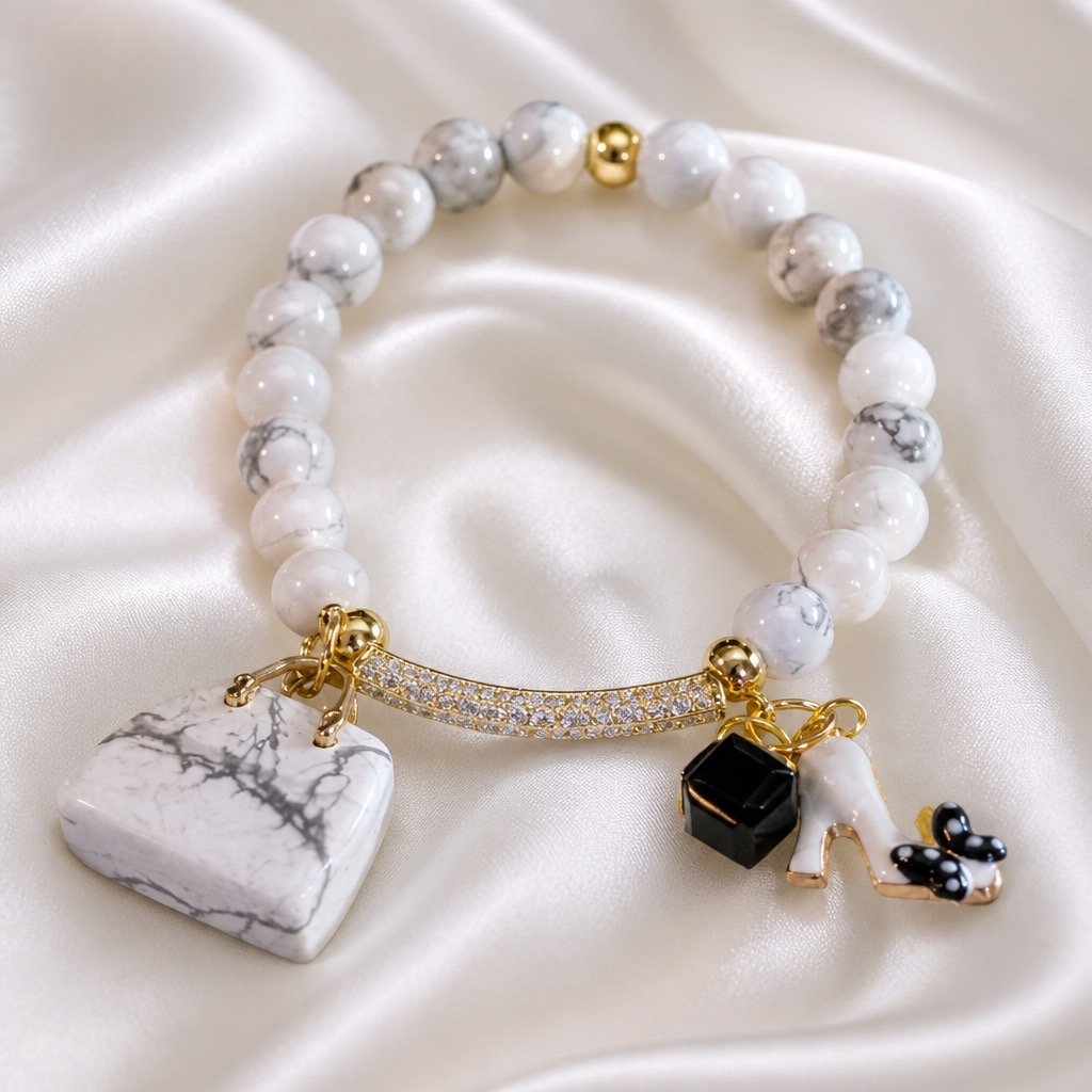 Black and Whilte Beaded Bracelet with While Silk Backdrop.JPG