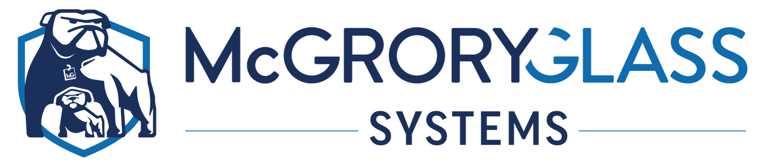 Logo of McGroy Glass Systems featuring a stylized gorilla in white and navy blue, with the company name in bold blue letters.