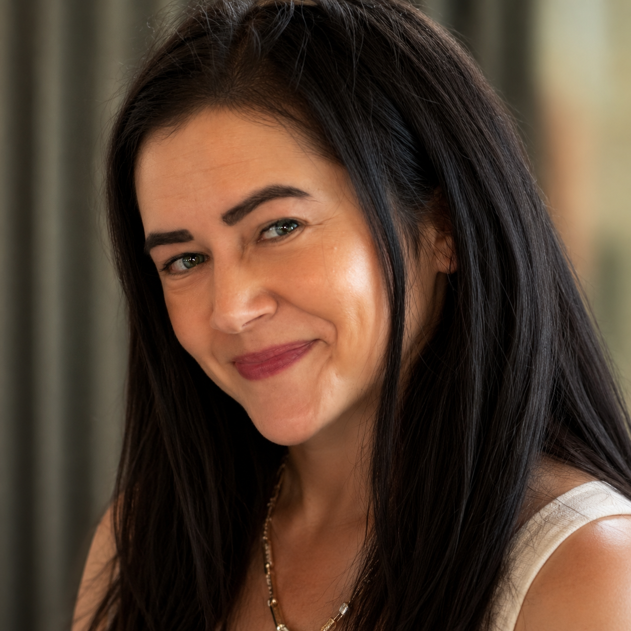 Professional headshot of Katie Berry, LCPC, EMDR and trauma therapist serving adults throughout Illinois.