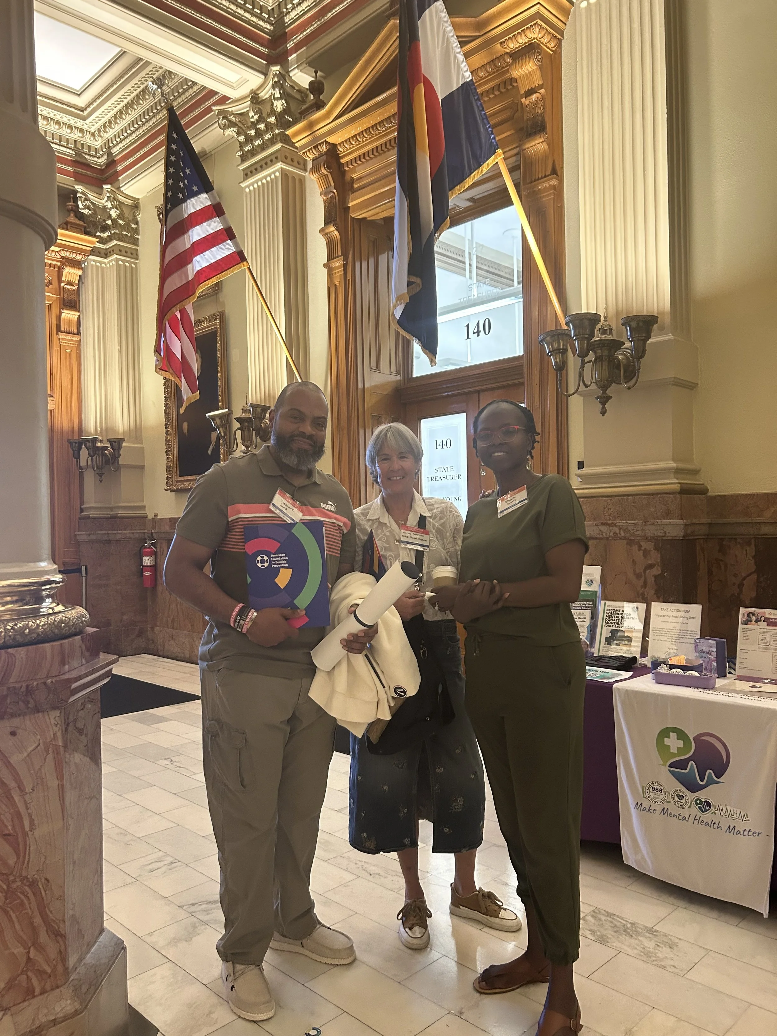Community advocates connecting during a mental-health awareness event.