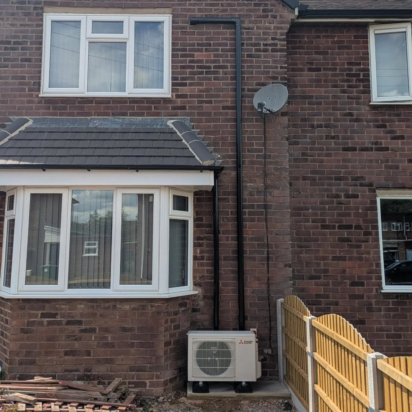 Air conditioning outdoor unit installation by Johnson Stratton Services