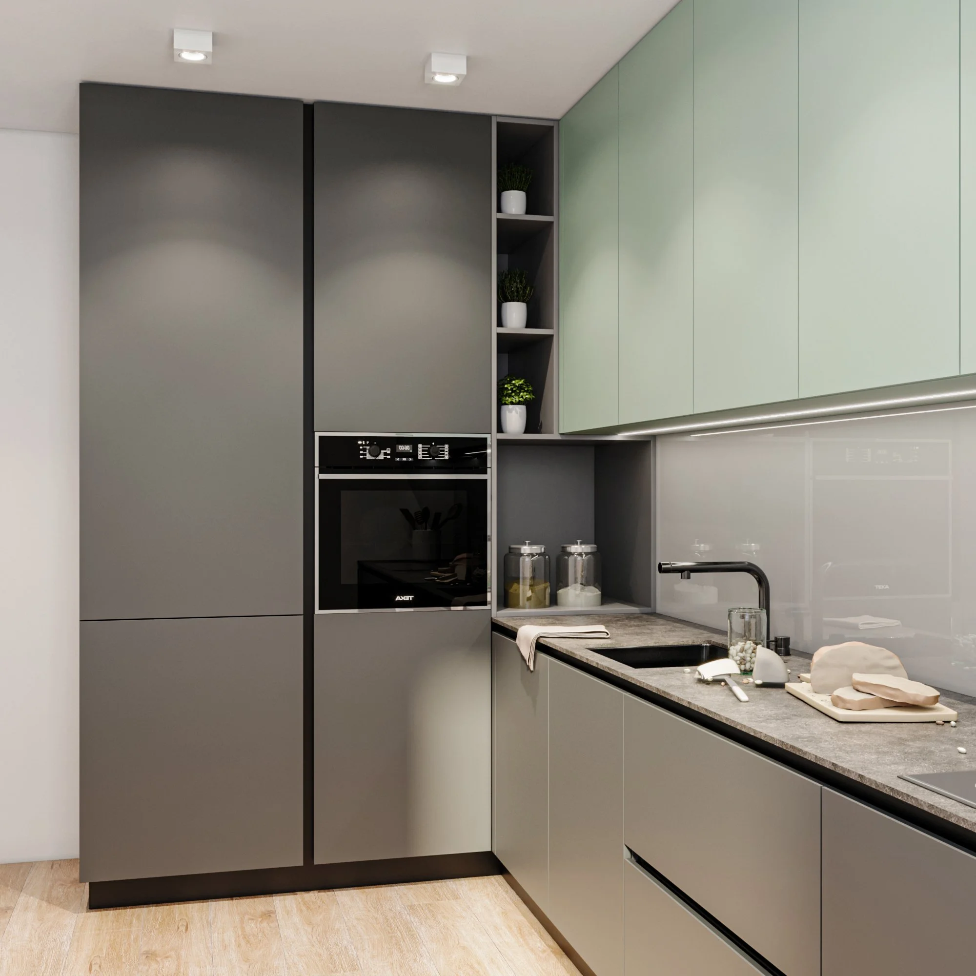 Modern kitchen with grey and green cabinetry, black oven, open corner shelves with potted plants, a countertop with cleaning supplies and utensils, a sink, and a wooden floor.