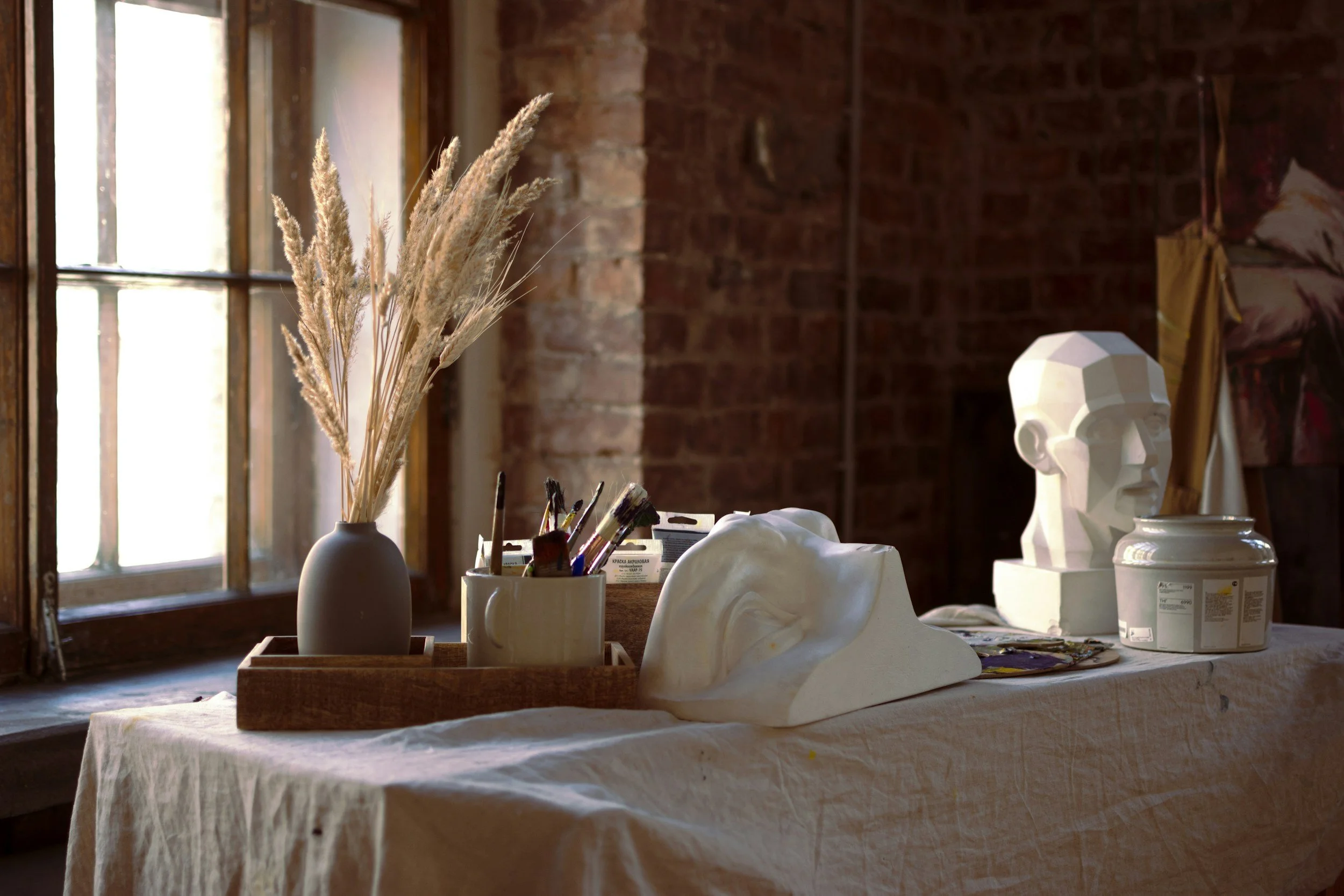 Minimalist spa decor featuring dried botanicals and calming elements in the Elyon Boutique Spa sanctuary.