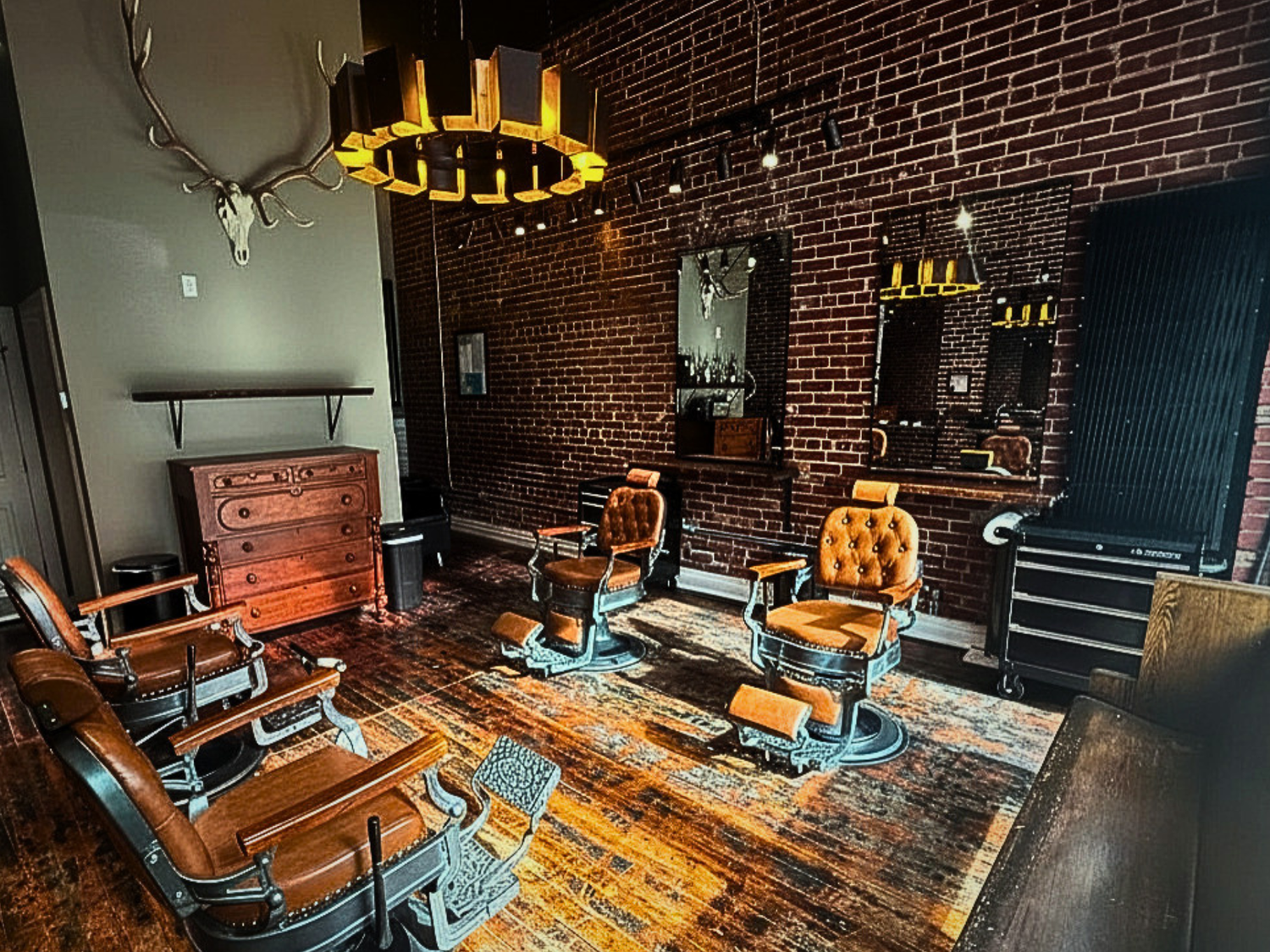 Bespoke Blade barber chairs and historic brick interior