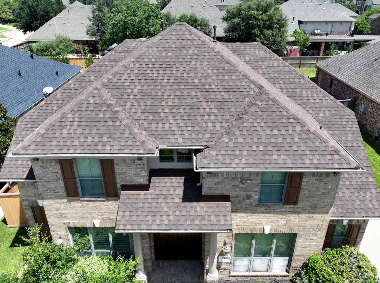 Atlas Pinnacle Pristine roof replacement in the color Weathered wood in the Fairfield subdivision in Cypress, Texas