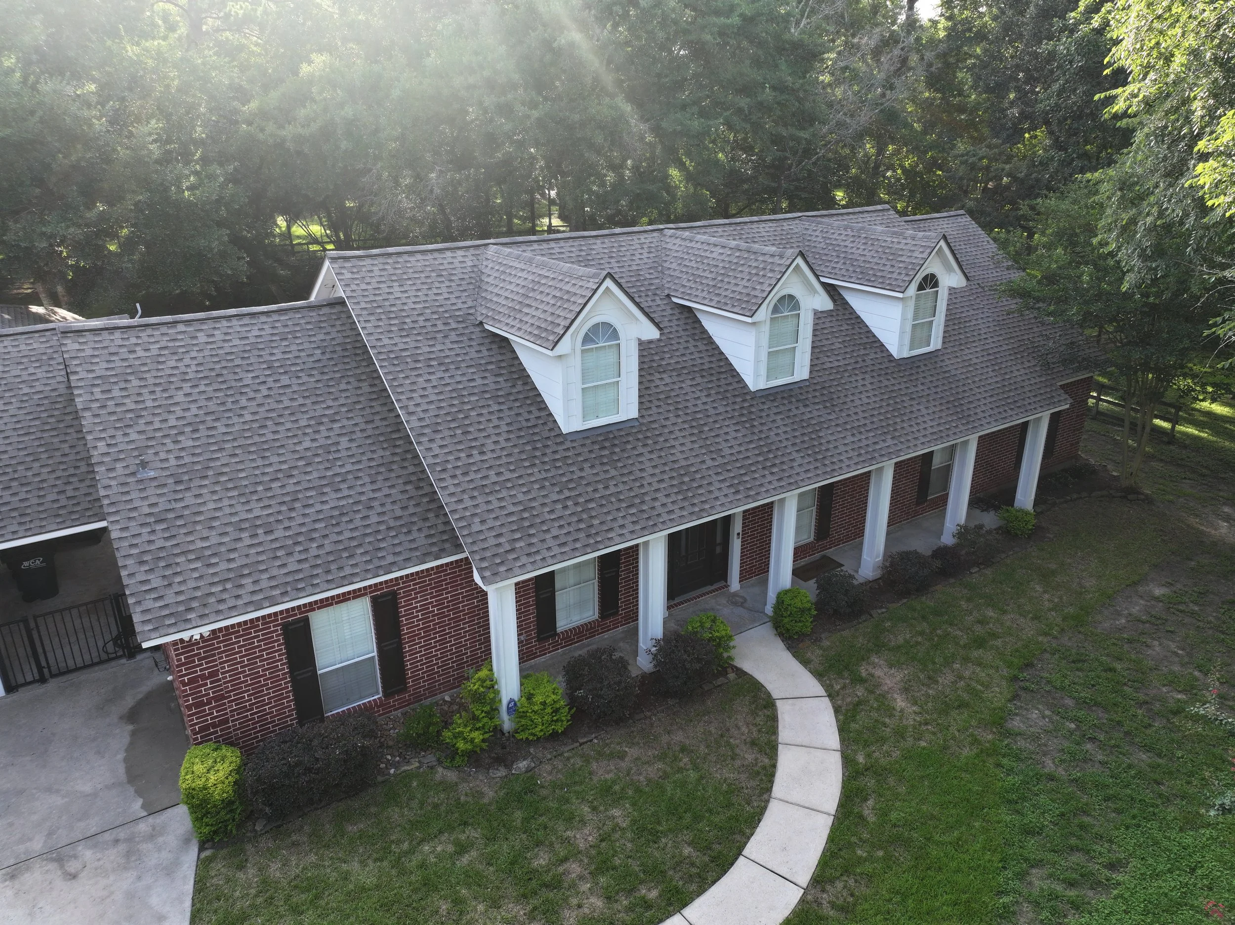 GAF Timberline HDZ roof replacement in the color weathered wood in Hockley, texas