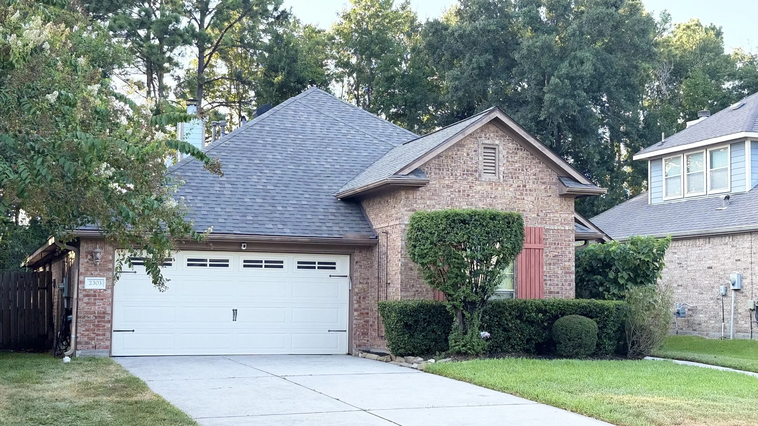Atlas Pinnacle Pristine roof replacement in the color weathered wood in spring, texas