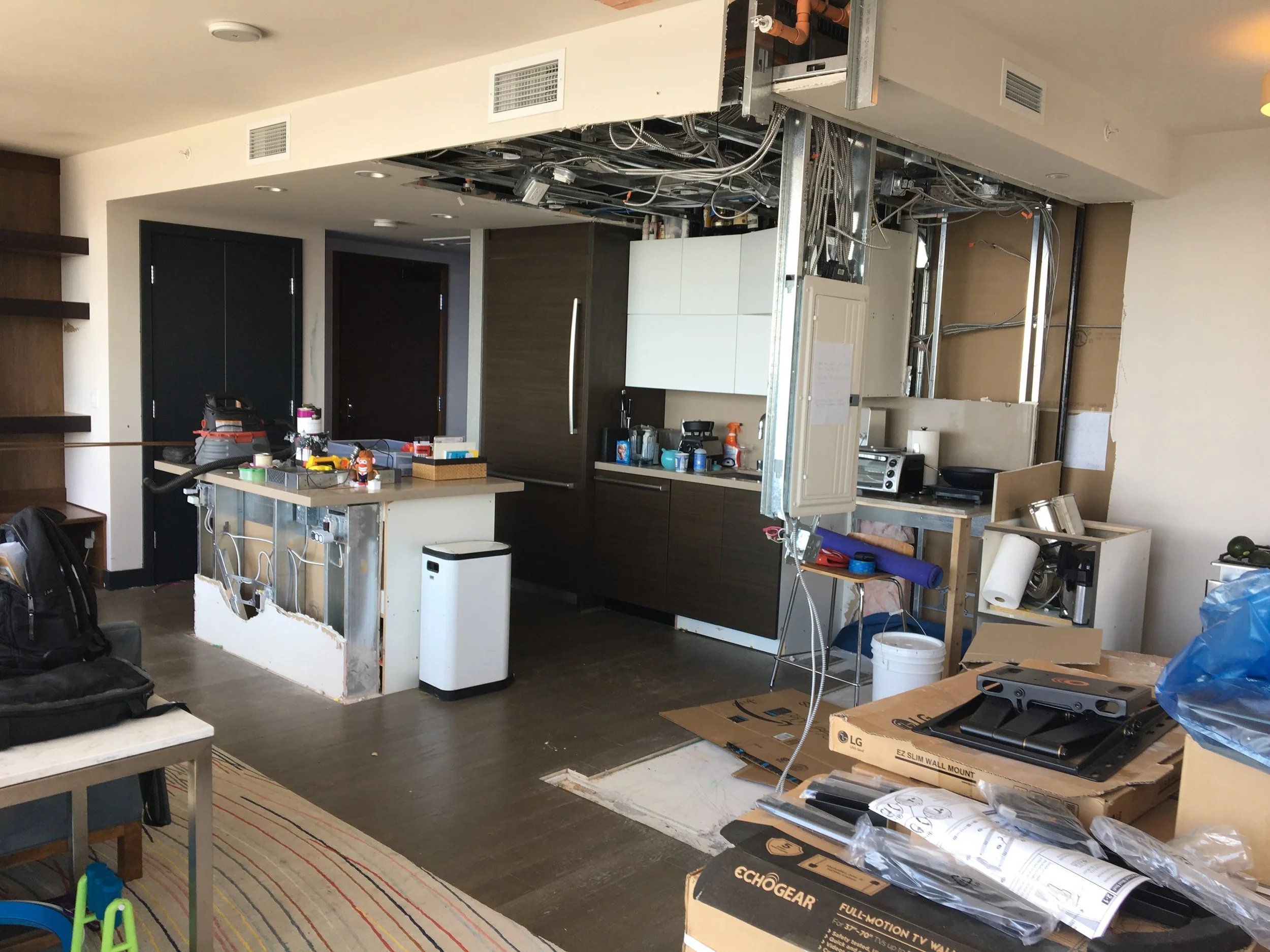 Before , removing small office to create larger kitchen