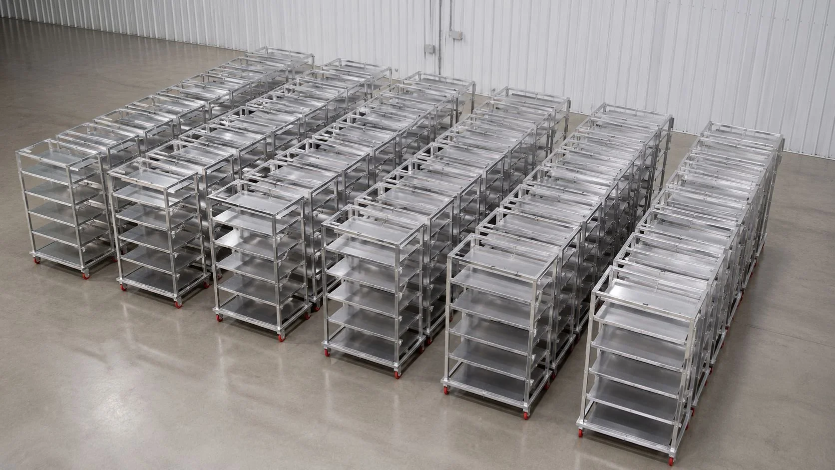 Custom fabrication and production of multiple aluminum carts built for industrial and commercial use, offering lightweight strength and long-lasting durability.