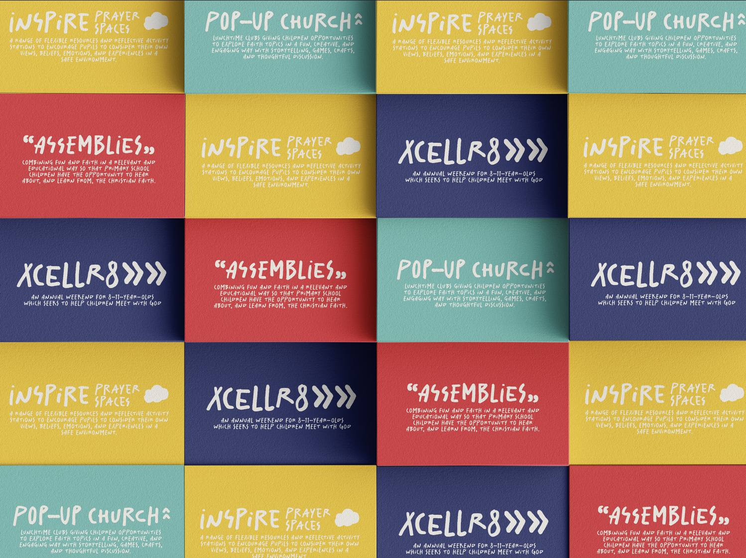 Colorful market stall signs with text promoting church-related youth events and activities, including pop-up church, Inspire prayer space, assemblies, and XCELL8 weekend for children, in bright yellow, blue, teal, and red panels.