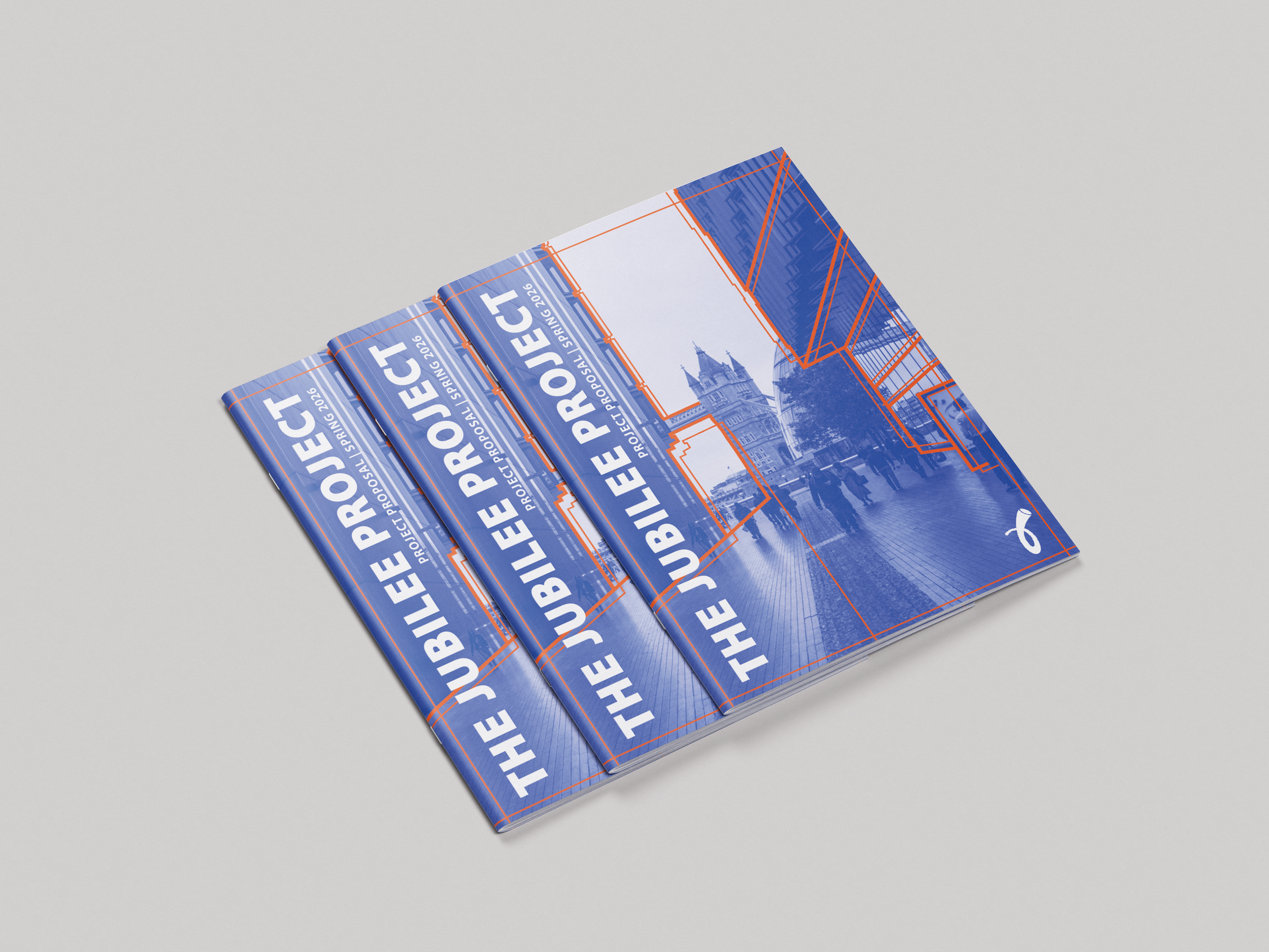 Three blue booklets titled "THE 2026 PROJECT" with cityscape and bridge images, stacked on a gray surface.