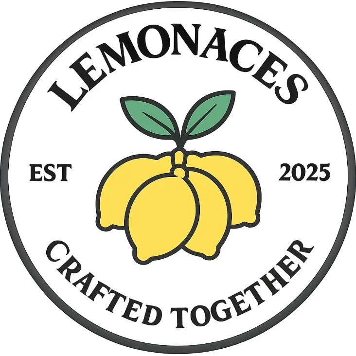 A circular logo with the text 'Lemonaces' at the top and 'Crafted Together' at the bottom. In the center, there are three yellow lemons with green leaves. The logo also includes the text 'EST 2025' on the sides.