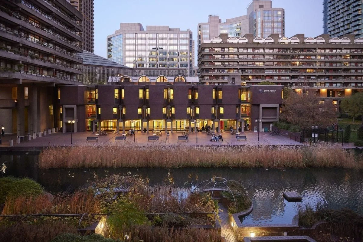 The Guildhall School of Music and Drama exterior at dusk