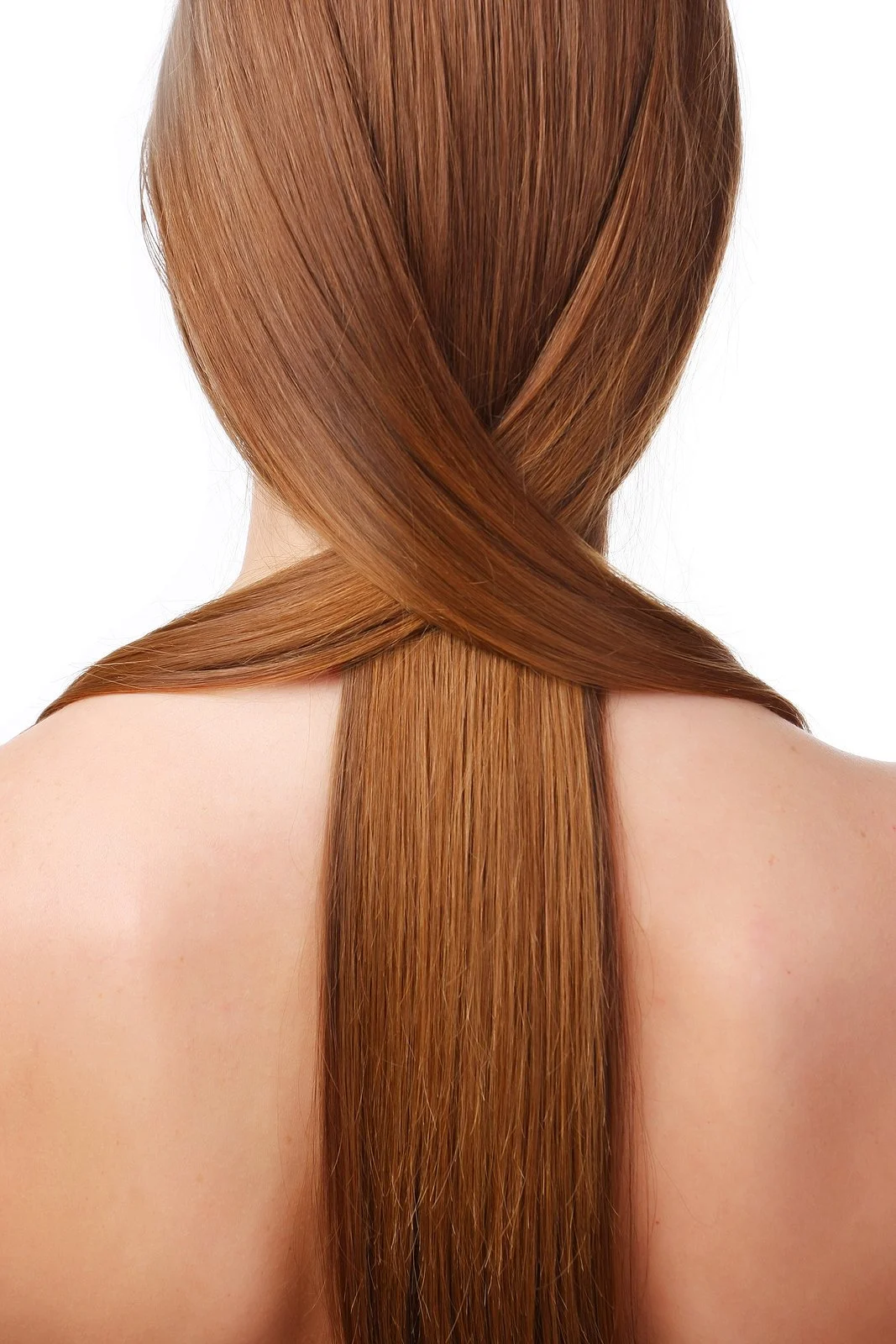 Back of a person with long, straight, reddish-brown hair styled in an X-cross pattern at the top.