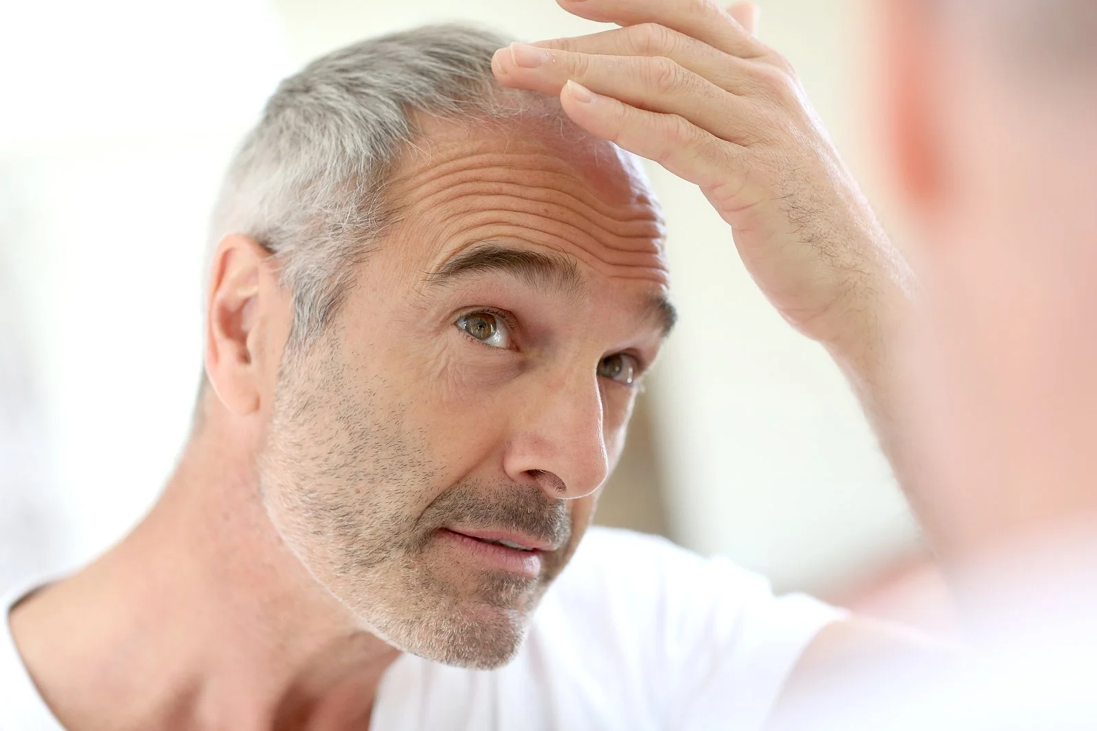 bigstock-Senior-man-and-hair-loss-issue-51464209.jpg