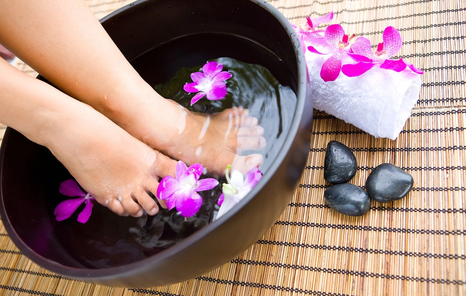 bigstock-Woman-soaking-feet-in-bowl-of--18061694.jpg