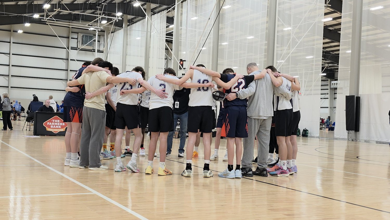 RAHA athletes in a team huddle