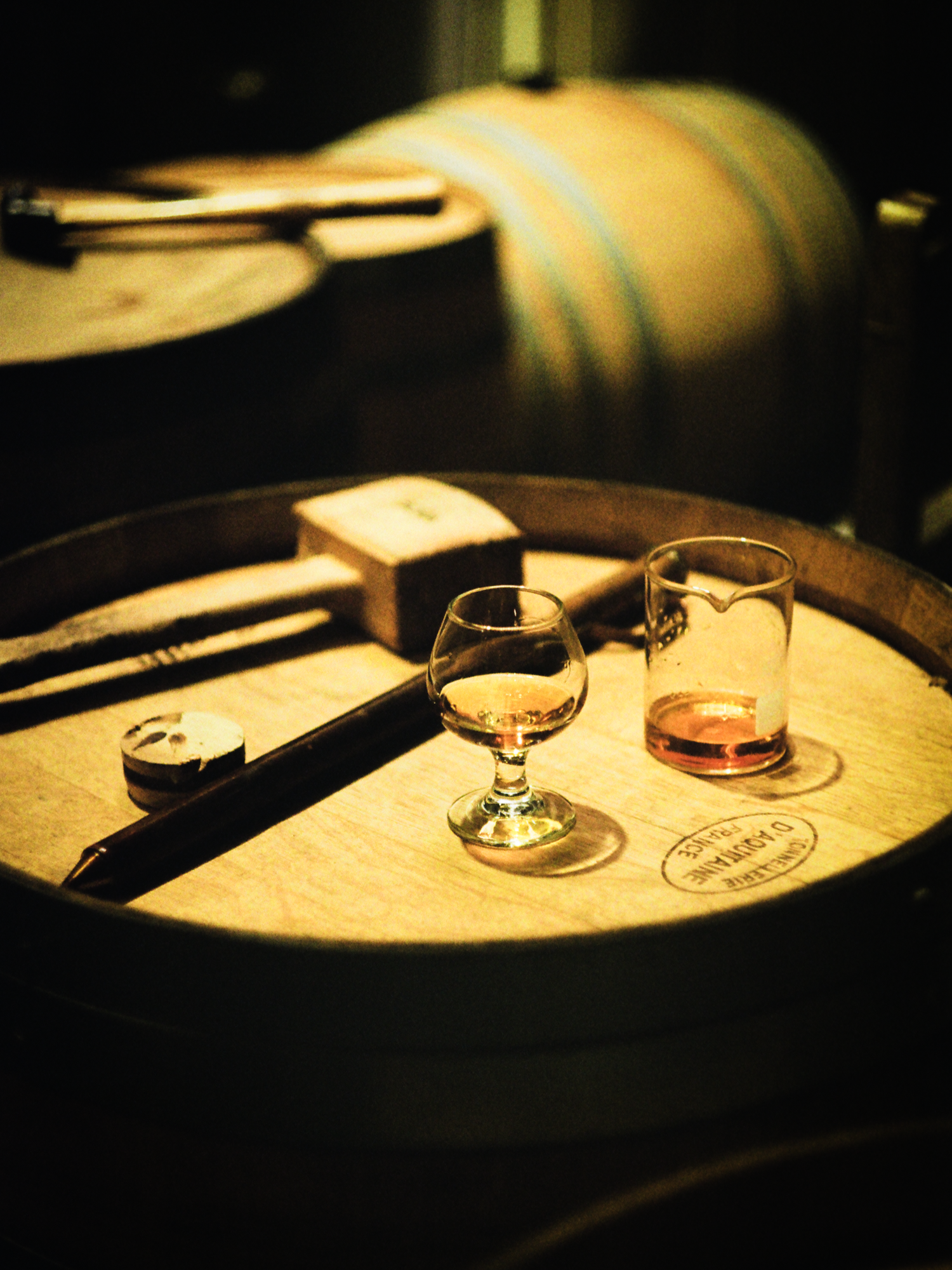 Two tasting glasses on a barrel head, shot on film