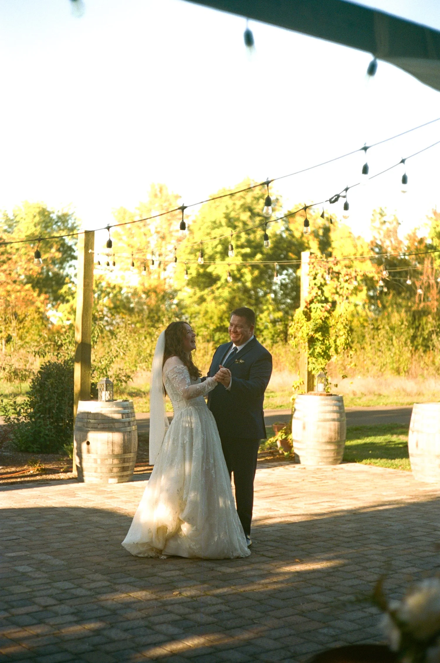Carley sharing a dance on the patio at Creekside Farms, shot on film