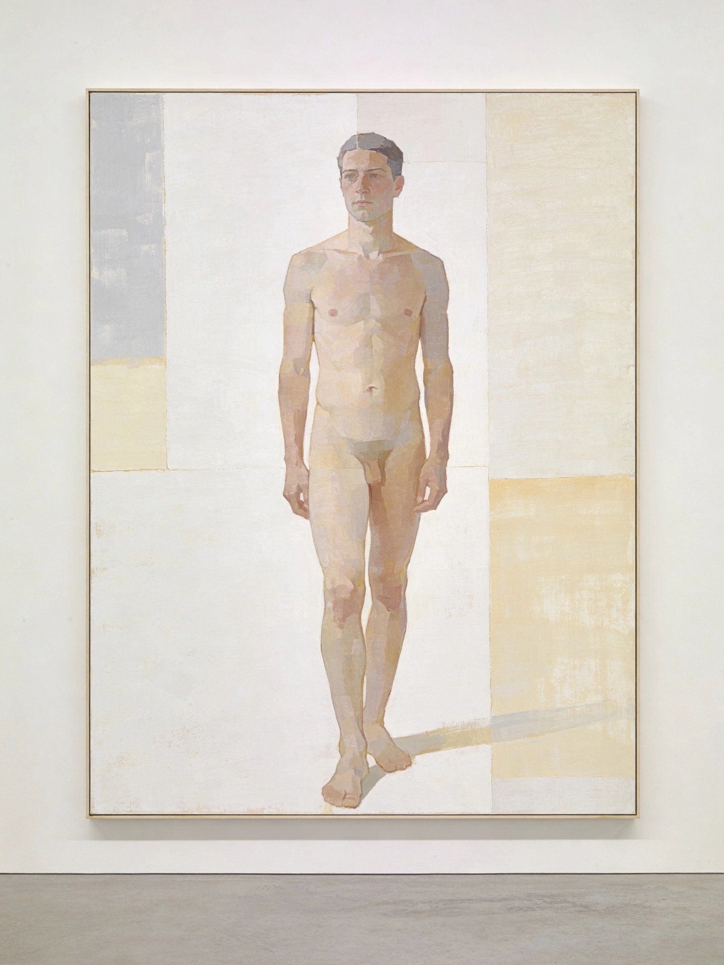 Painting of a standing nude man with a neutral expression, against a background divided into light pastel blocks.