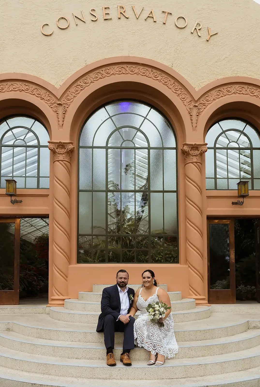 Couple eloping at Fitzroy Gardens Conservatory Melbourne — I Do Drive Thru elopement celebrant from $400