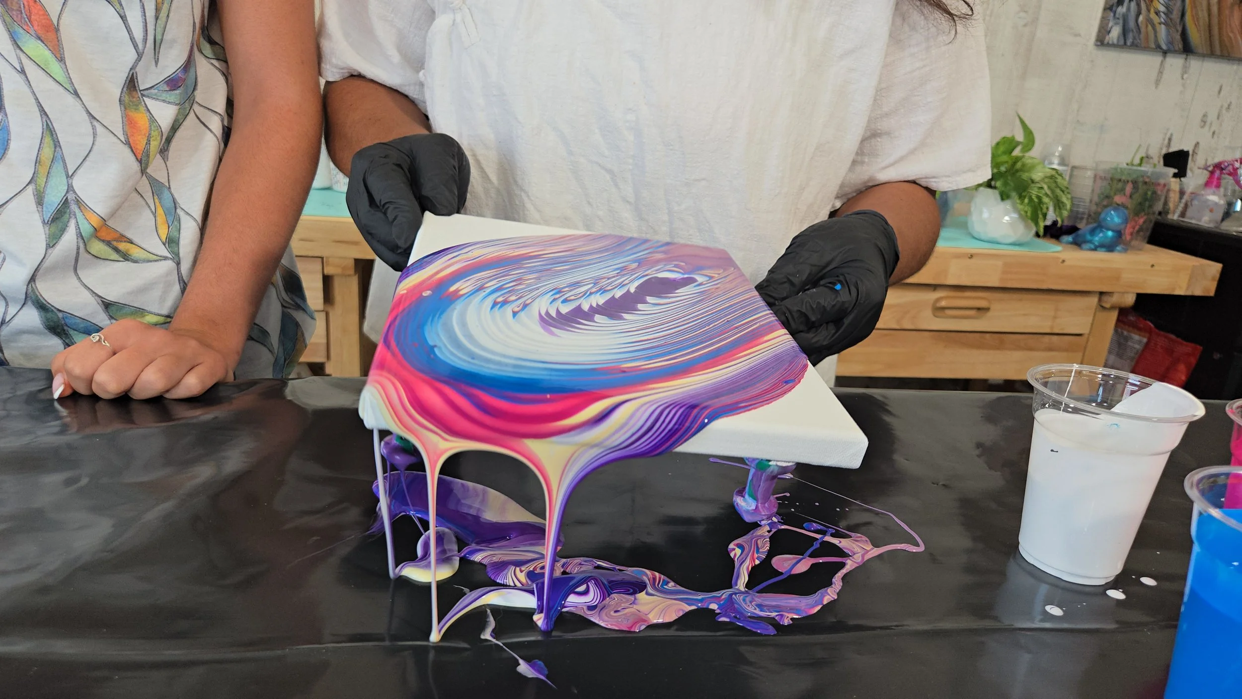 She will show you how to tilt your canvas and why... and then it's your turn!