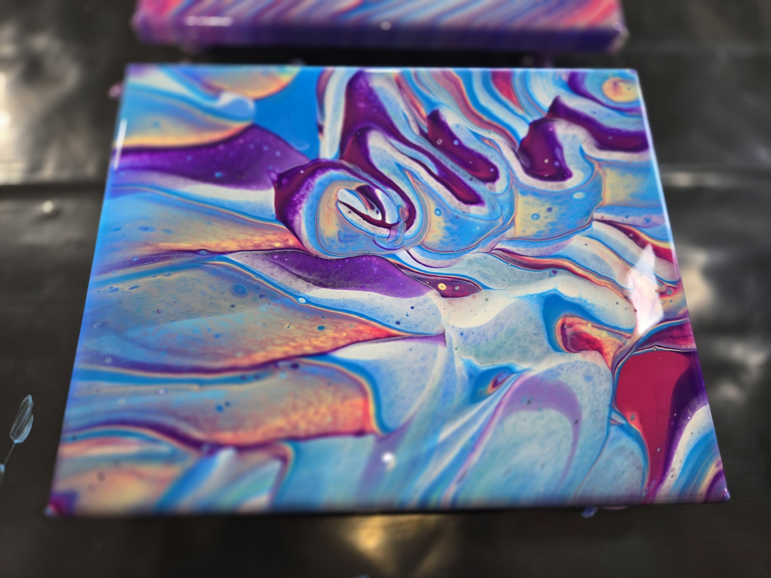 Your painting will dry in a few days then you can pick it up!