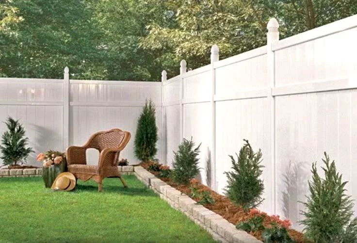 LawnSolver profession white privacy fence and mulch install