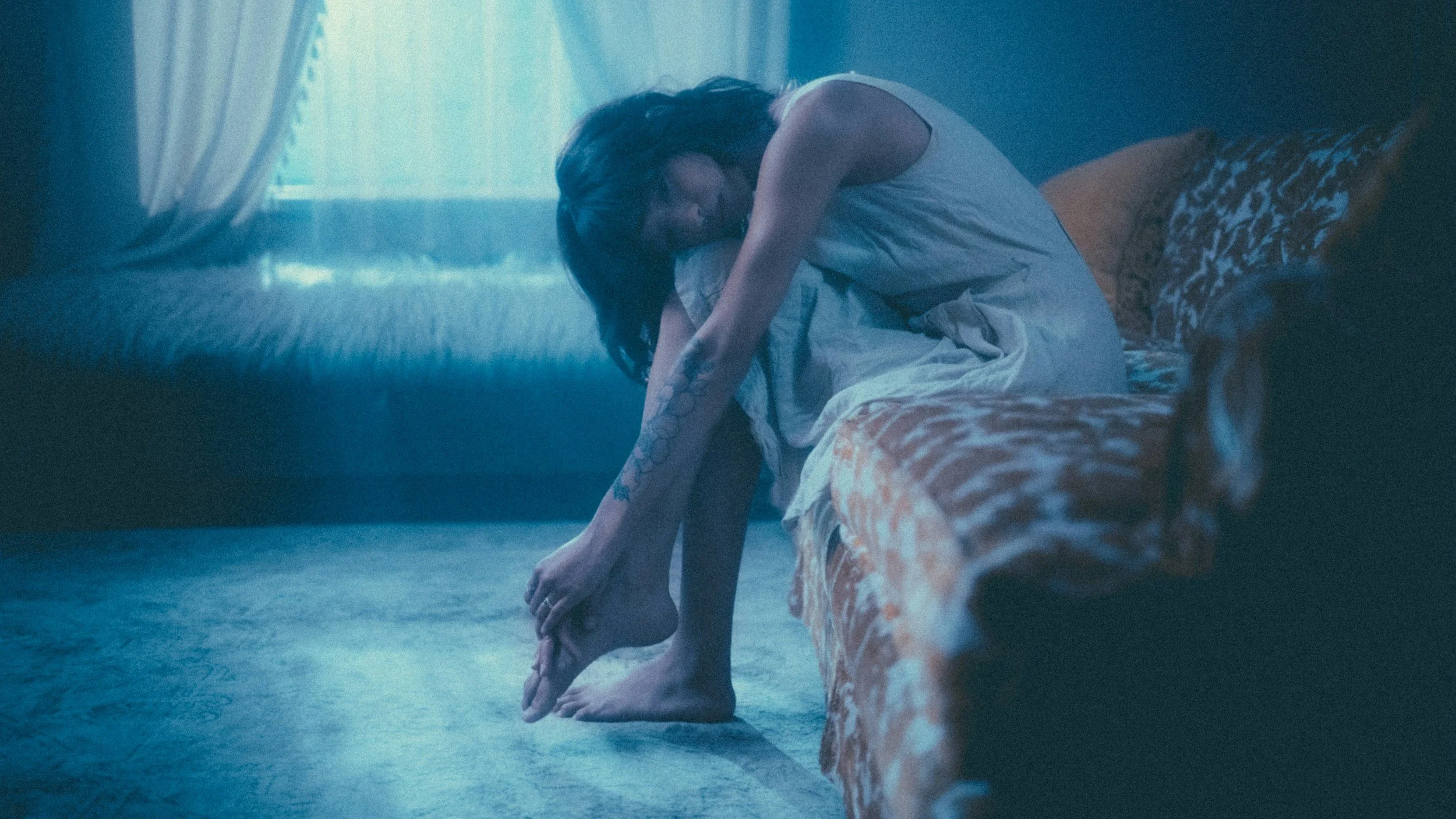 Woman struggling with ADHD, addiction, and emotional overwhelm