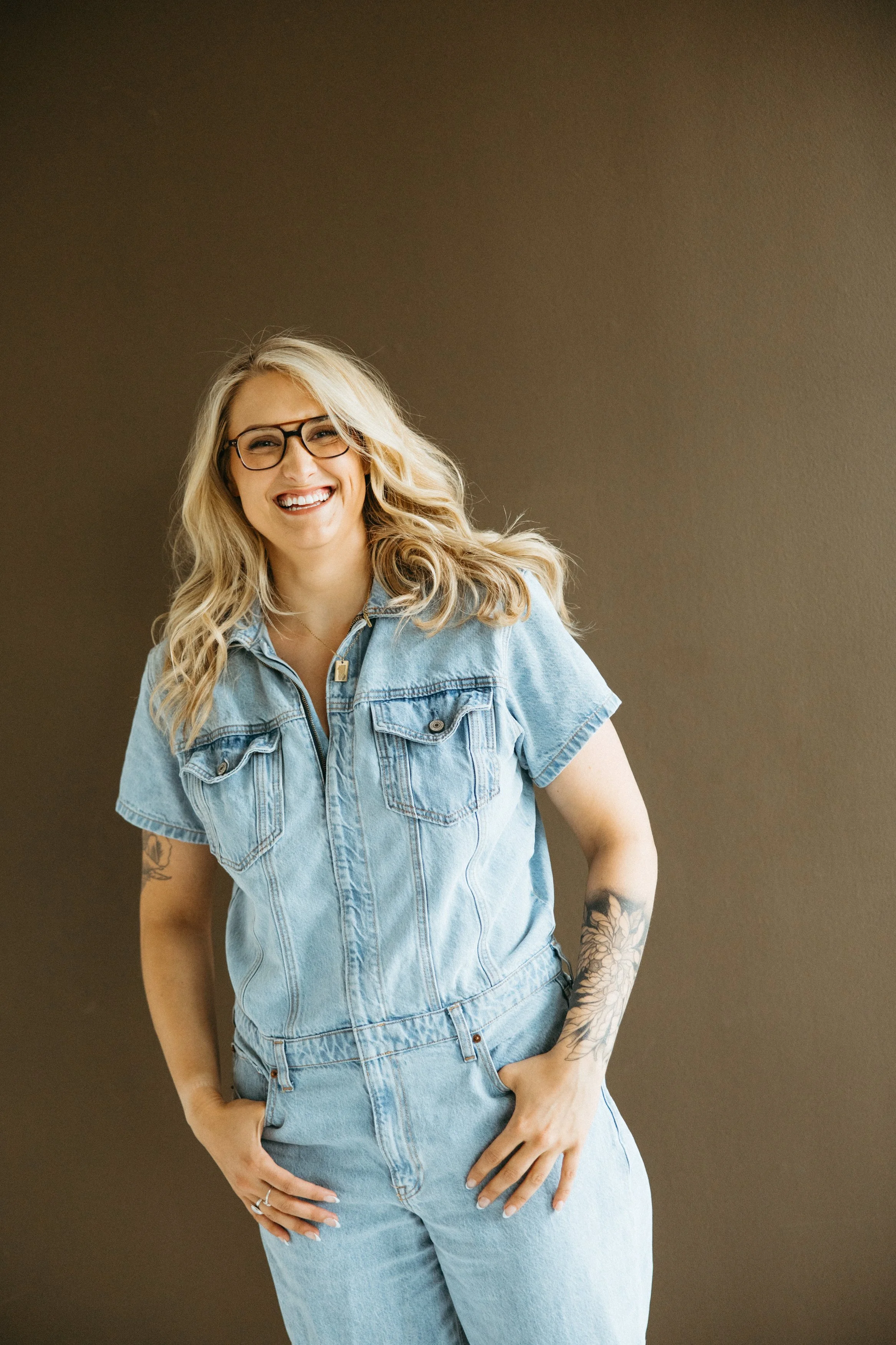 Hannah Guy, trauma and PTSD therapist in Pennsylvania and Colorado, standing and smiling