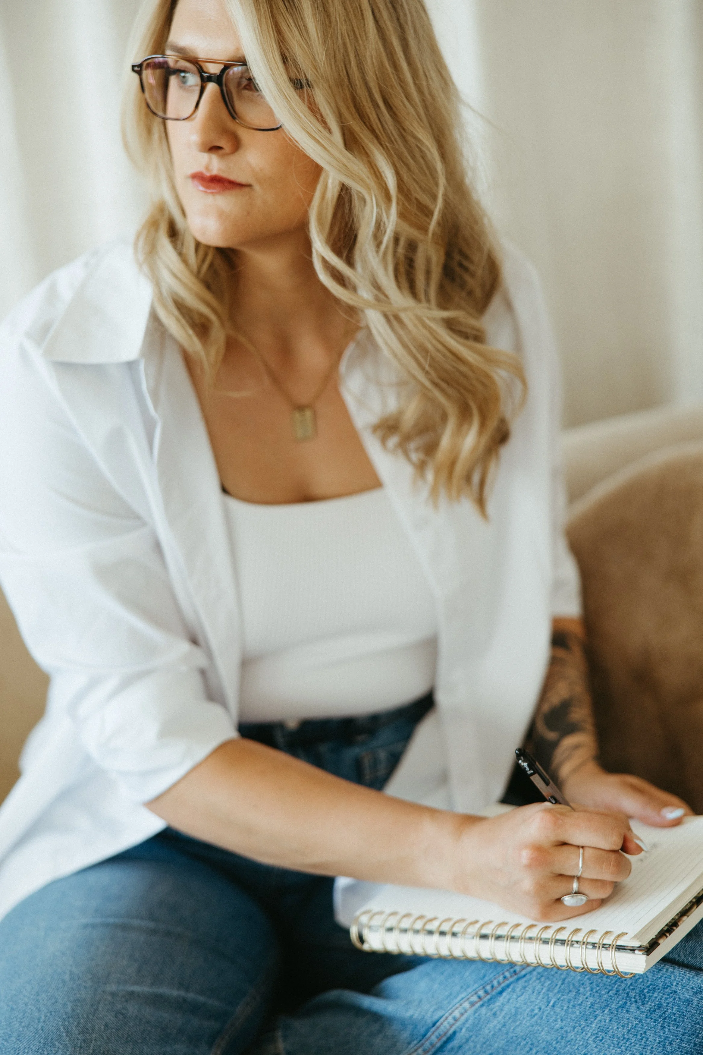 Hannah Guy journaling as part of ADHD therapy and self-reflection