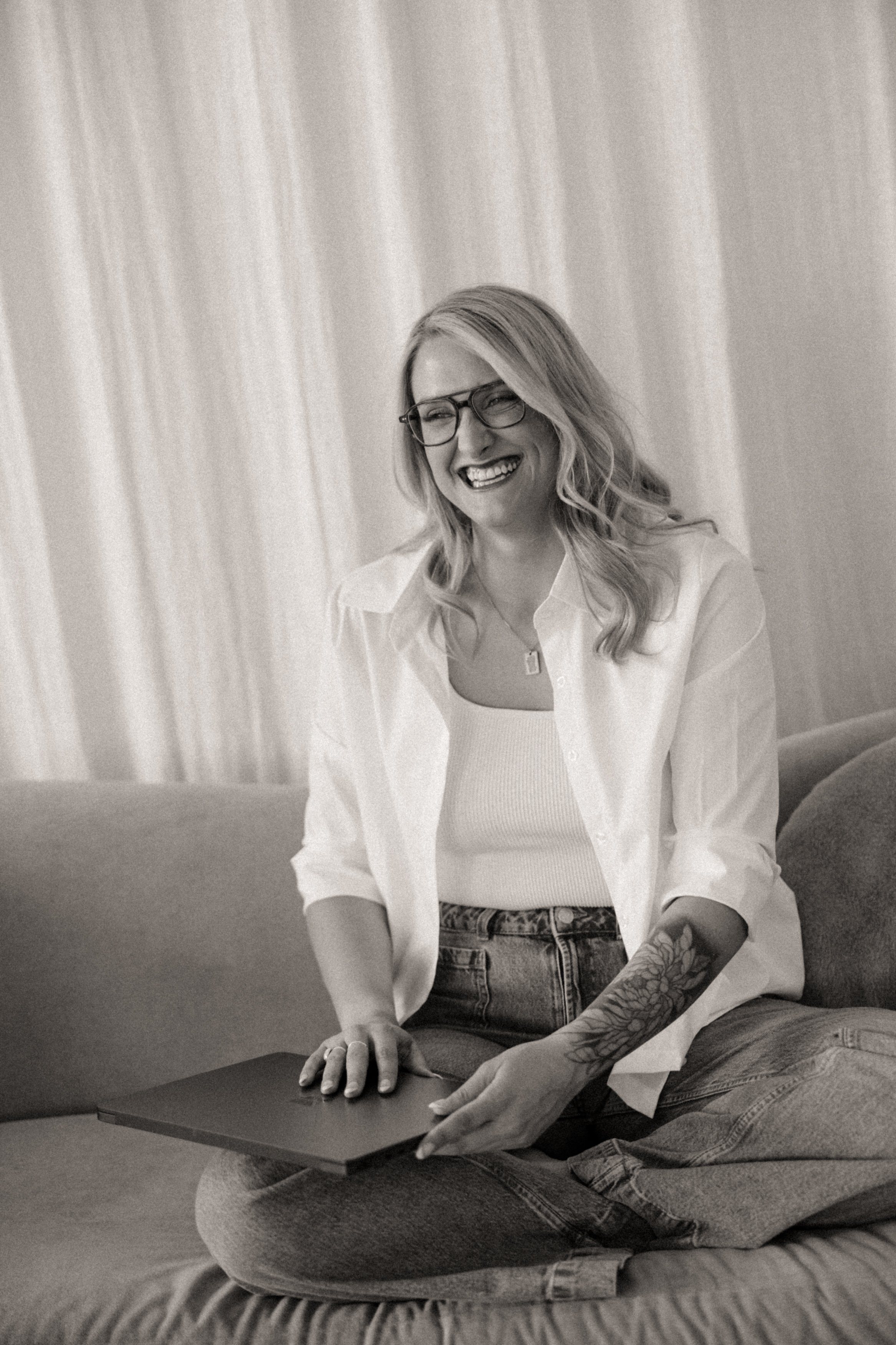 Woman smiling for trauma and PTSD therapy in Pennsylvania and Colorado