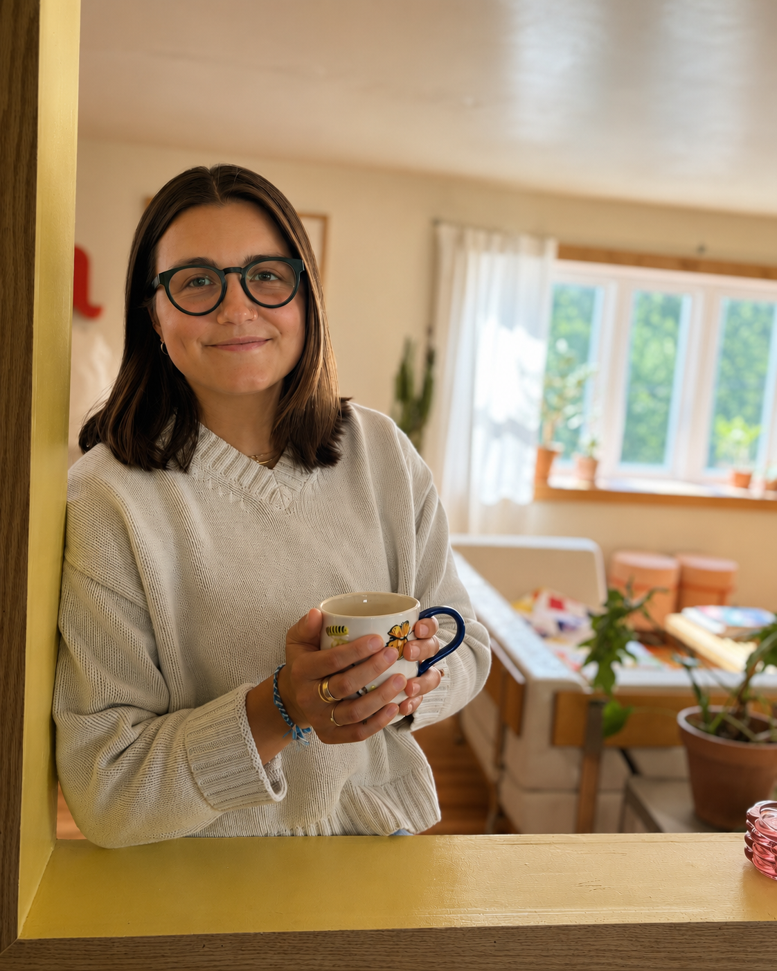 trauma therapist smiling and holding mug in Pennsylvania