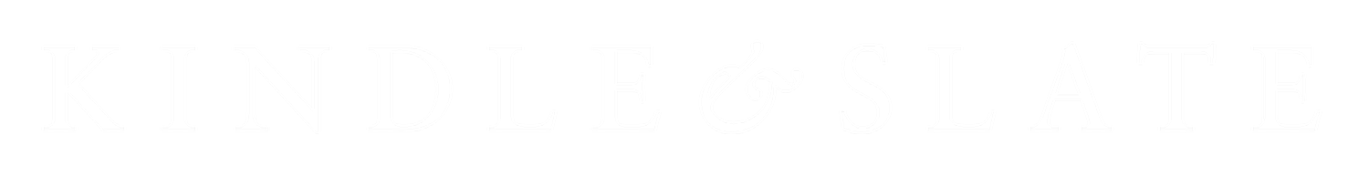 The logo for Kindle & Slate, with the words 'KINDLE & SLATE' in white text on a black background.