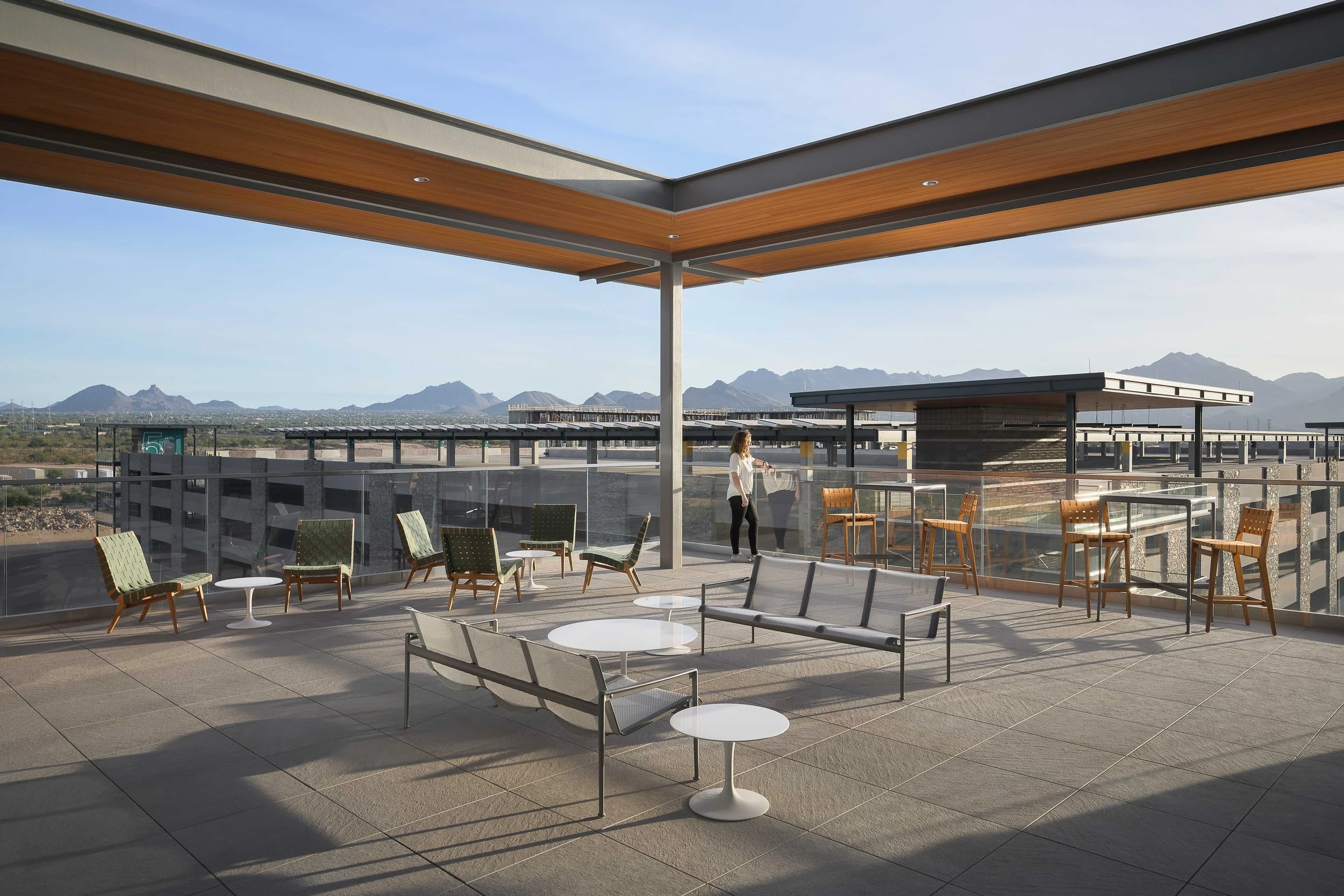 Modern rooftop terrace with mountain views and outdoor seating — commercial architecture photography Scottsdale AZ
