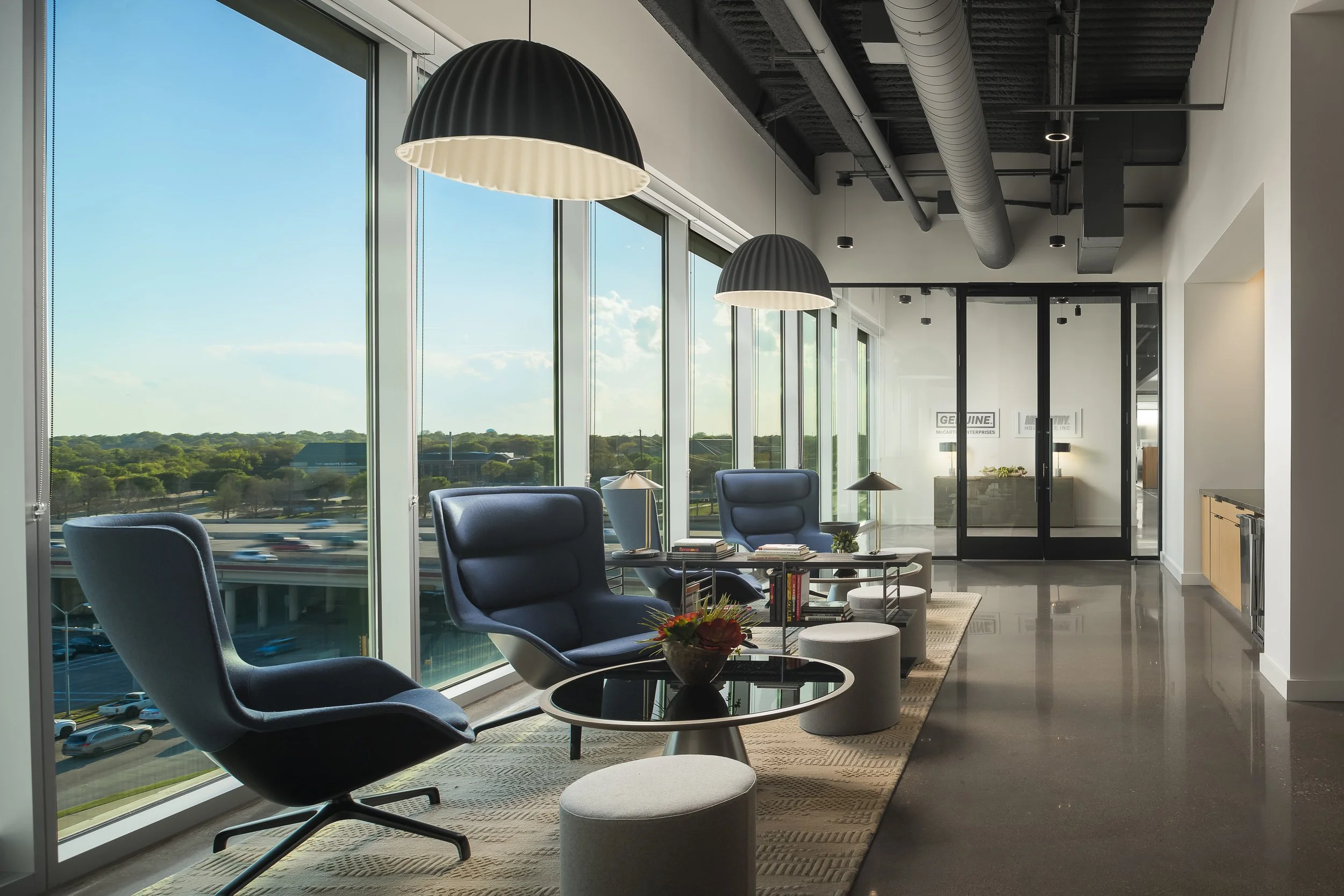 Contemporary rooftop lounge with city views and modern outdoor seating — commercial architecture photography