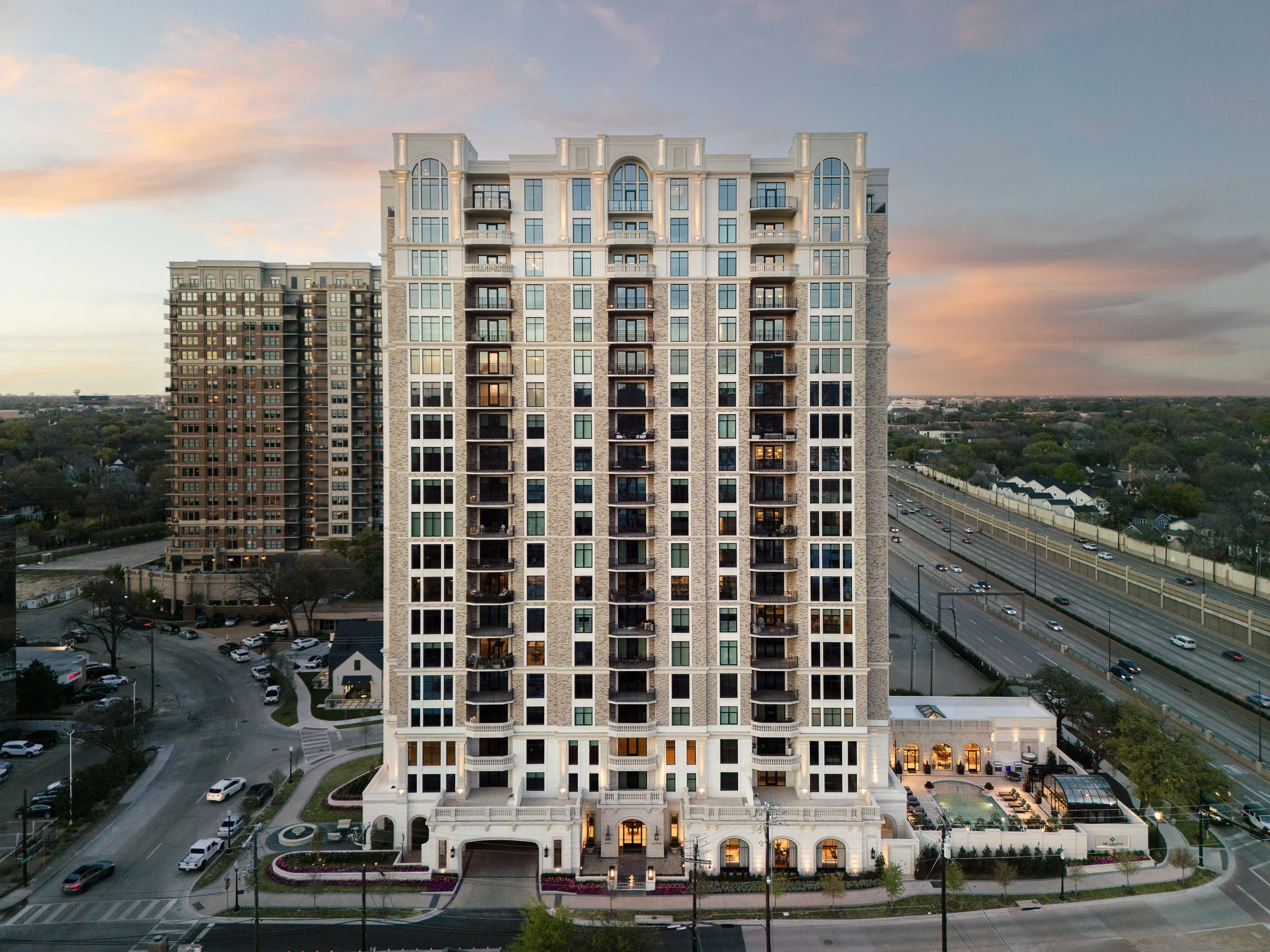 Aerial drone view of luxury high-rise tower in urban Dallas context — commercial architecture photography, The Galatyn Dallas TX